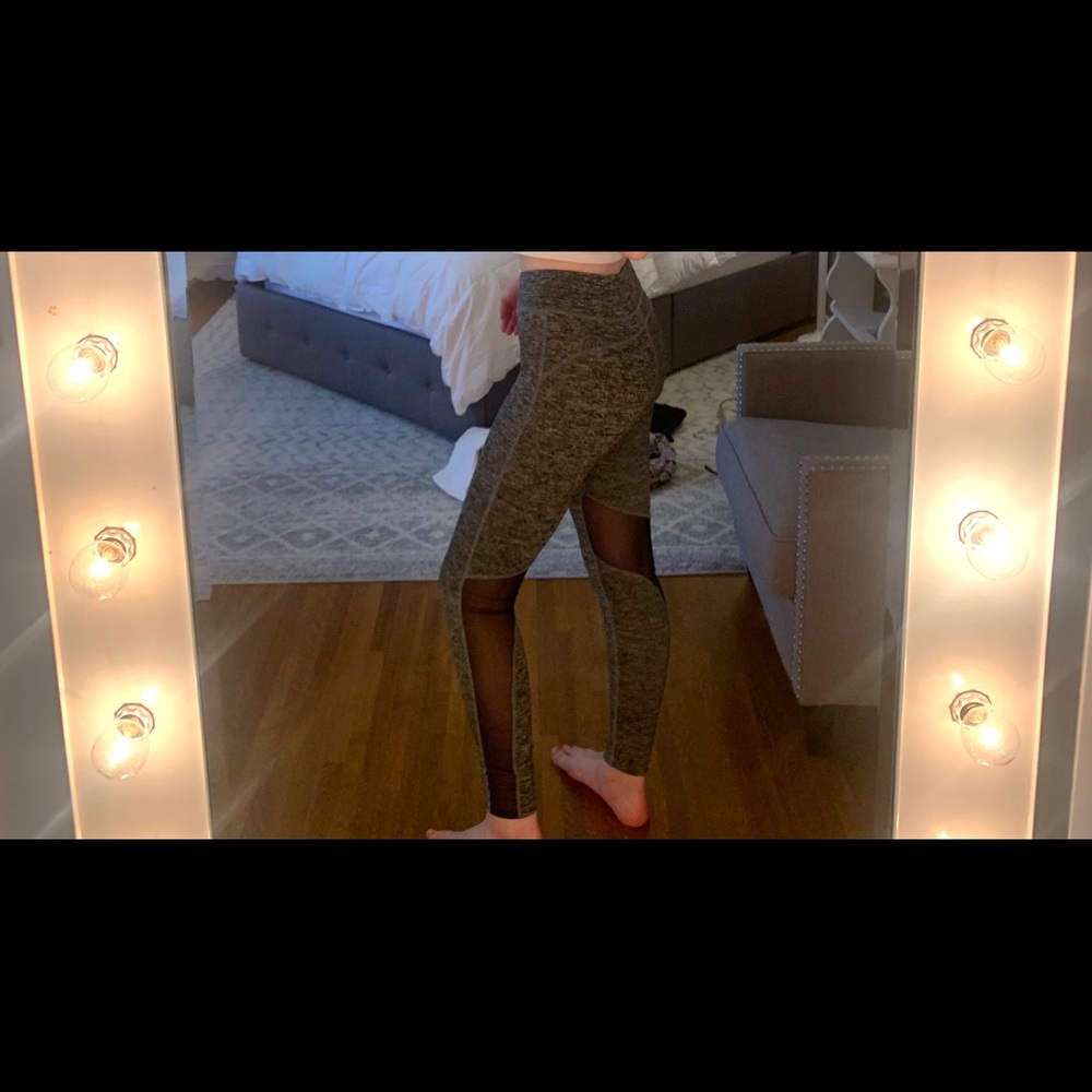 Gray leggings with black mesh cut outs